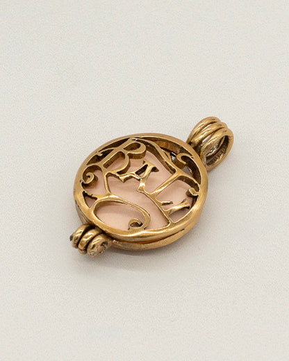 Intricately designed Gold Scent Locket with a vintage-inspired filigree pattern, crafted to hold a delicate aroma insert for personal aromatherapy.
